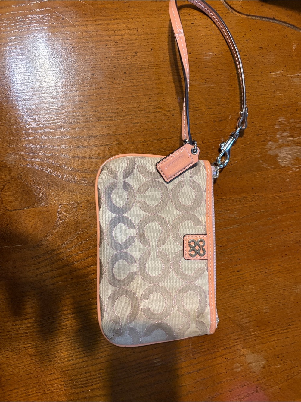 Coach Signature Canvas Wristlet Phone Case with Peach Trim
